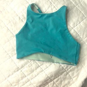Blue and teal reversible sports bra size: kids large